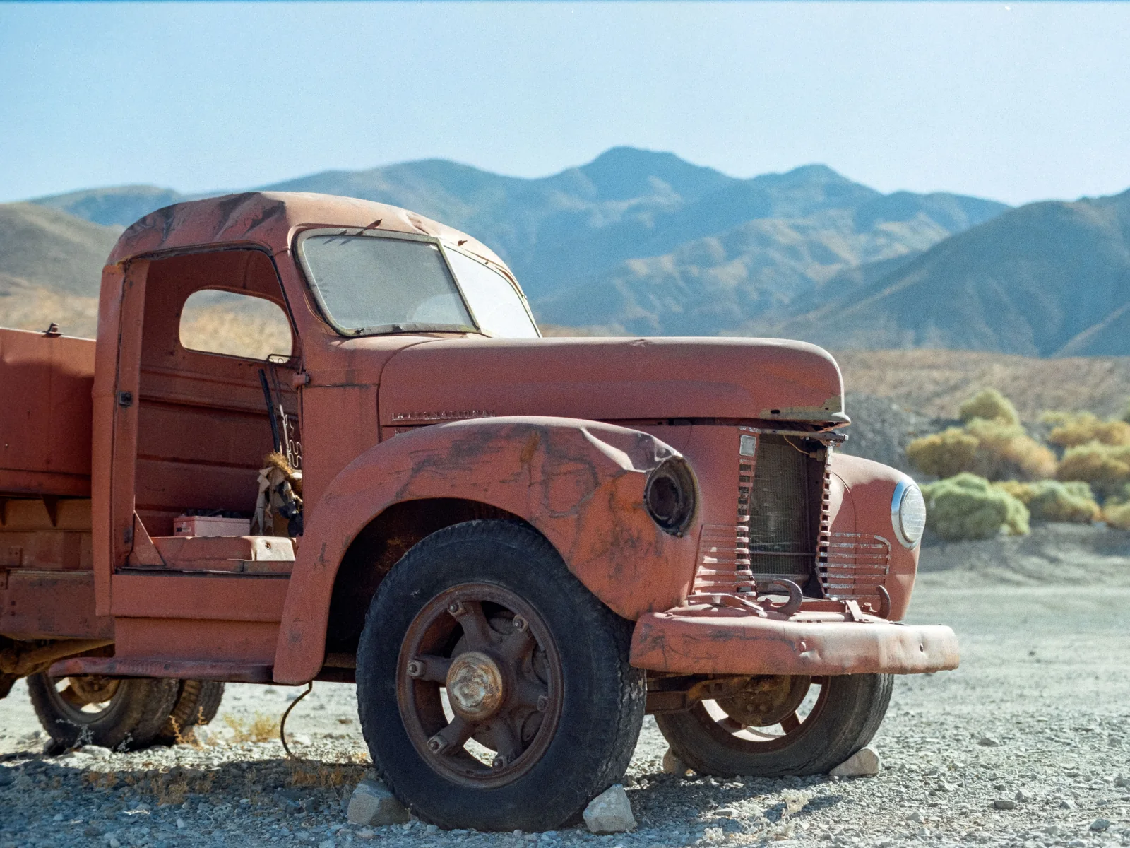 Vintage truck in front of mountains